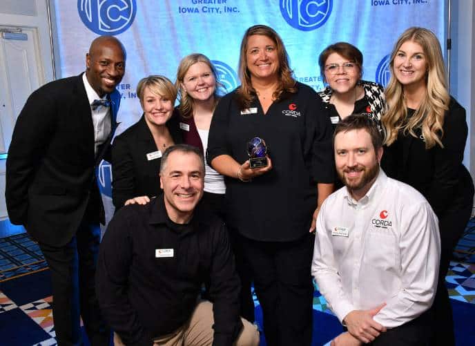 Corda Credit Union employees with Kenyon Murray at the Greater Iowa City Inc. A Toast to Business Awards